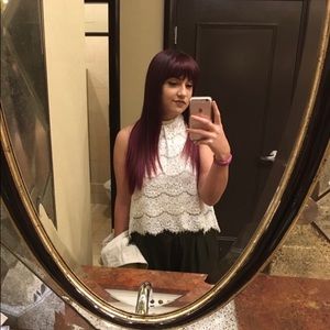 White lace crop tank top key hole detail in the back. Single pleat in the front.